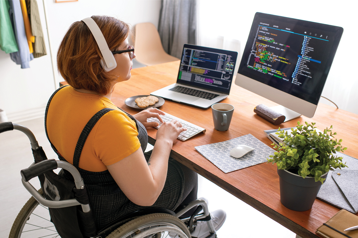 Woman In Wheechair Coding